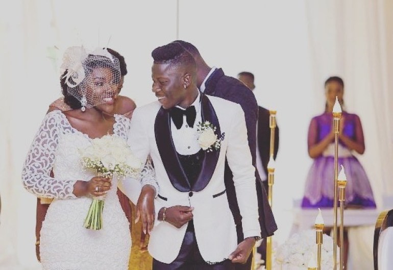 Stonebwoy and wife Dr. Louisa Ansong in wedding photo