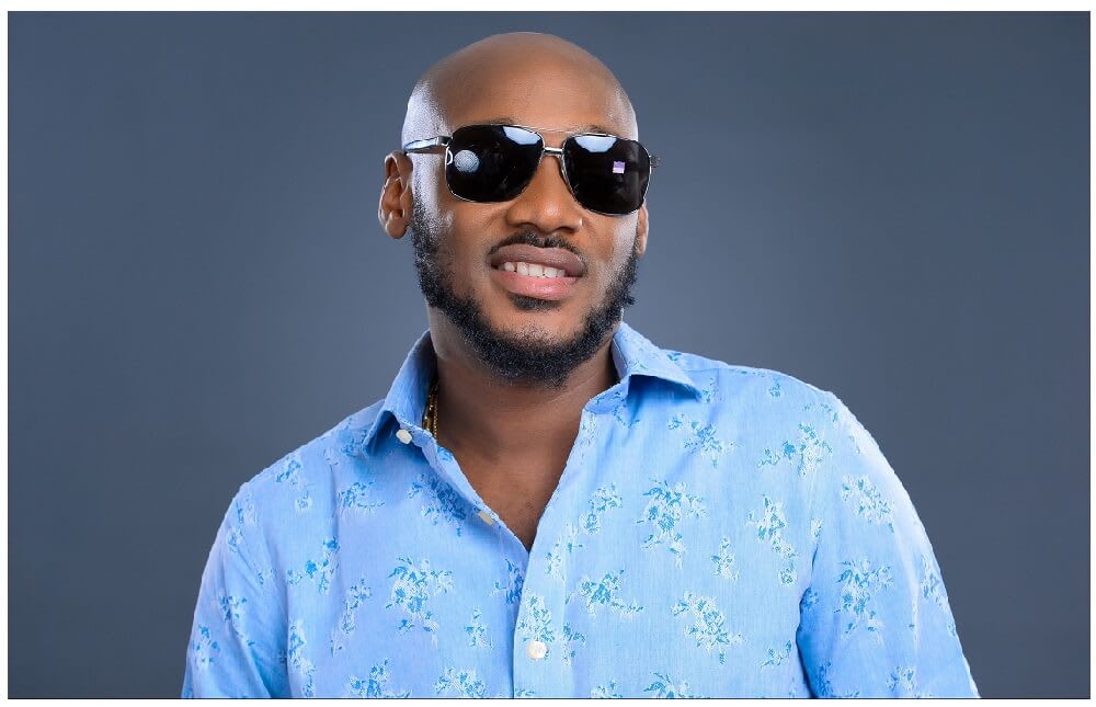 2Face Idibia gives a nod to Obi Cubana with a hint of shade