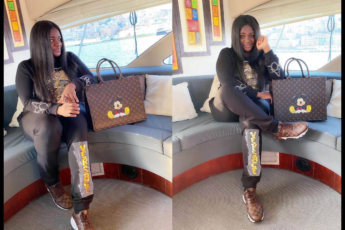 PHOTOS: As Usual, Tracey Boakye Rocks A Fake Gucci Handbag With A Big Sticker Of A Mickey Mouse Pasted On It