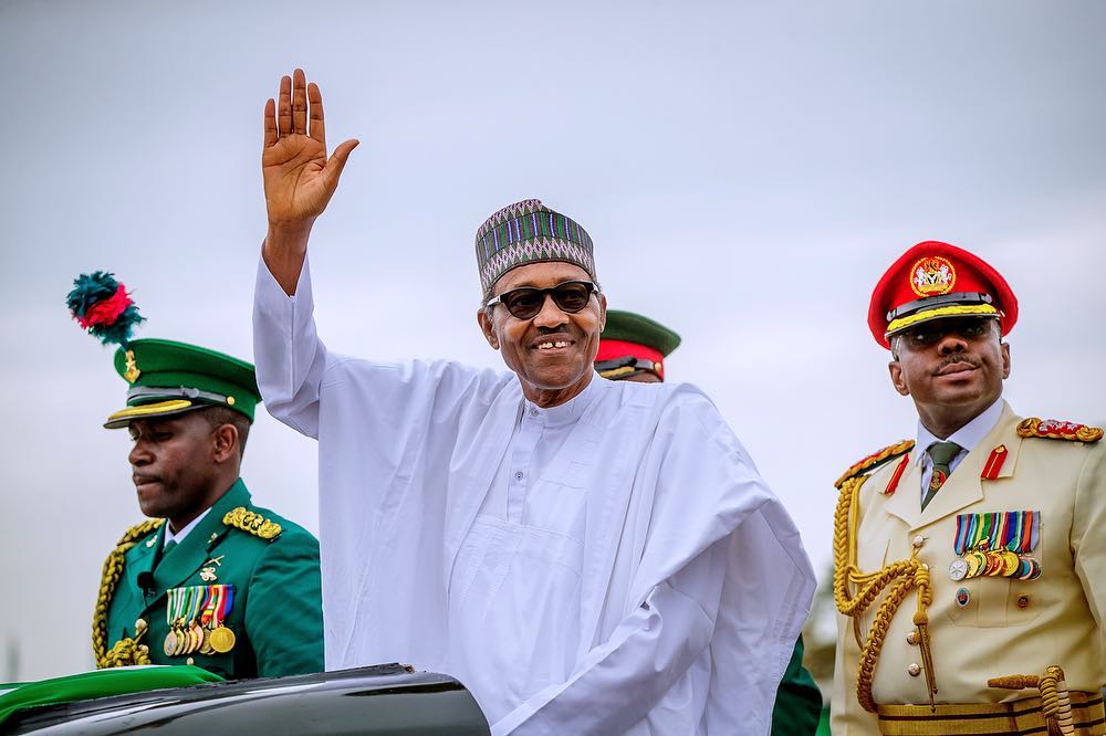 Controversy as Former President Buhari, Posts New Picture of Himself Smiling