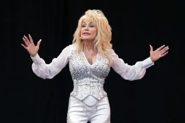Why did Dolly Parton pull out of the race to be inducted into the Rock & Roll Hall of Fame?