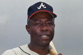 Who was Hank Aaron and what did he do?  What rights did Hank Aaron fight for?