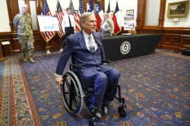 Why is Greg Abbott in a wheelchair?