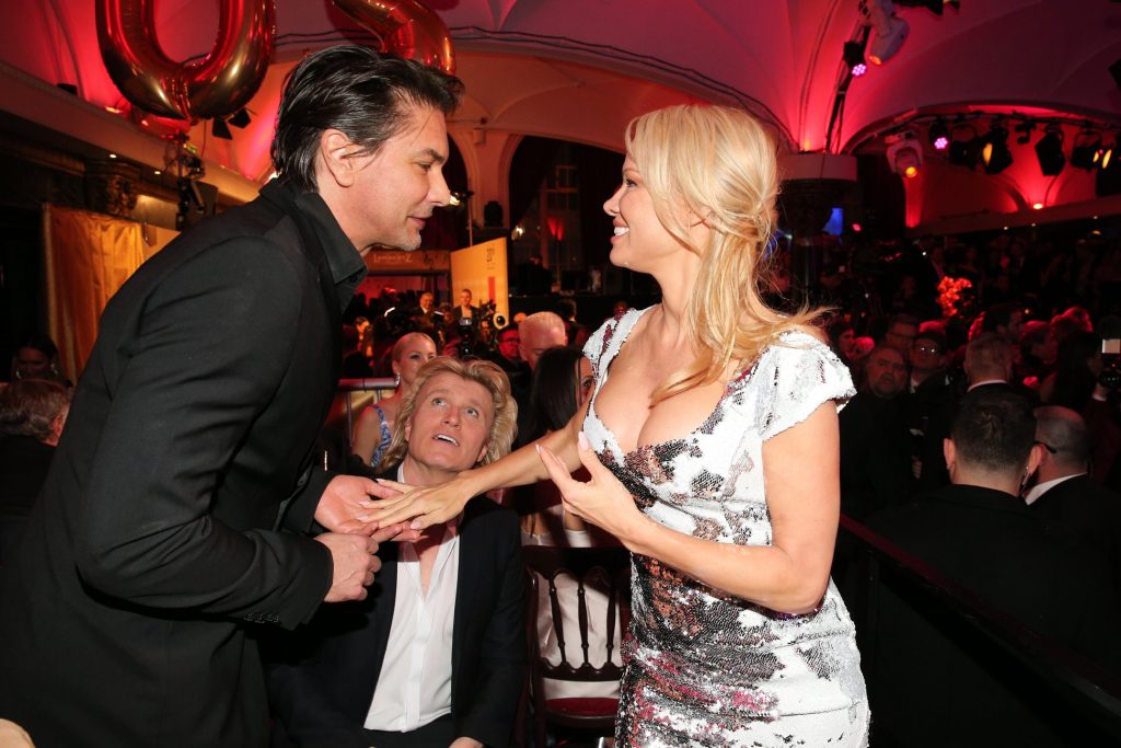 Marcus Schenkenberg and Pamela Anderson