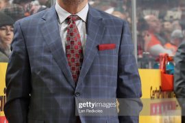Why was Alain Vigneault fired by Flyers?