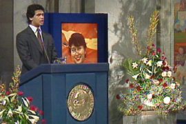 Why did Alexander Aris receive the Nobel Peace Prize on behalf of his mother?
