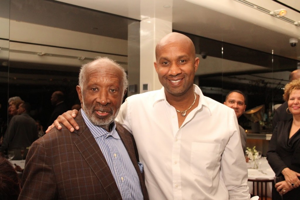 Clarence Avant and his son