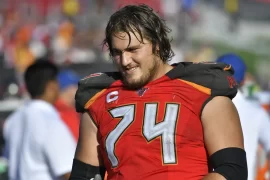 Has a Division 3 football player ever made it to the NFL? Is Ali Marpet left or right guard?