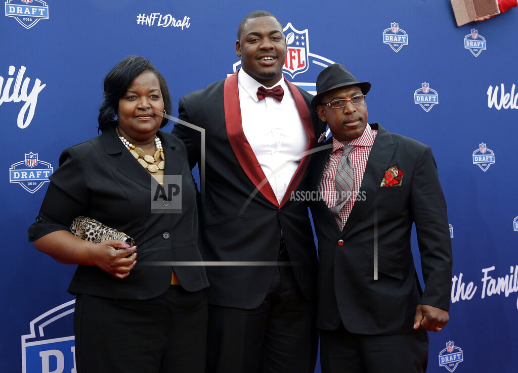 Chris Jones and his parents