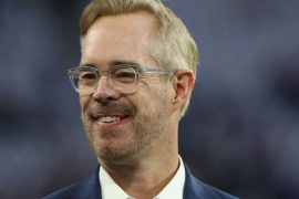 Did Joe Buck play football?