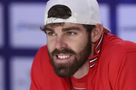 Where is Reilly Opelka from? What size shoe does Reilly Opelka wear? Where does Reilly Opelka train?