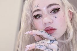 Who is Grimes net worth?