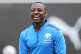 Who is the biological father of Shaun Wright Phillips?