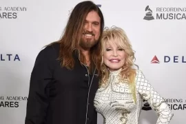 Is Dolly Parton related to Billy Ray Cyrus?