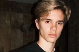 What is Romeo Beckham doing?