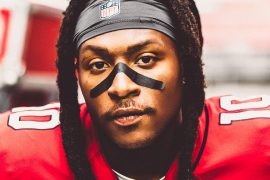 Who burned DeAndre Hopkins Mom?