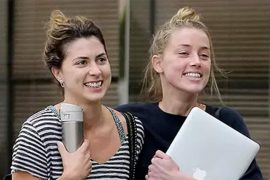 Who is Raquel Pennington to Amber Heard?