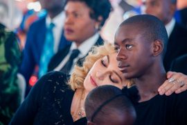 Does Madonna have any biological children? What age Madonna gave birth? How many African kids does Madonna have?