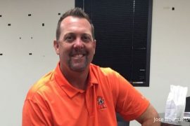 Who is Oklahoma State University softball coach?