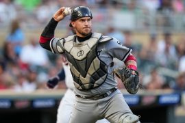 How many stolen bases does Yasmani Grandal have? Is Yasmani Grandal a good defensive catcher?