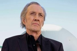 What was David Carradine wearing when he was found dead? What was David Carradine doing when he died?