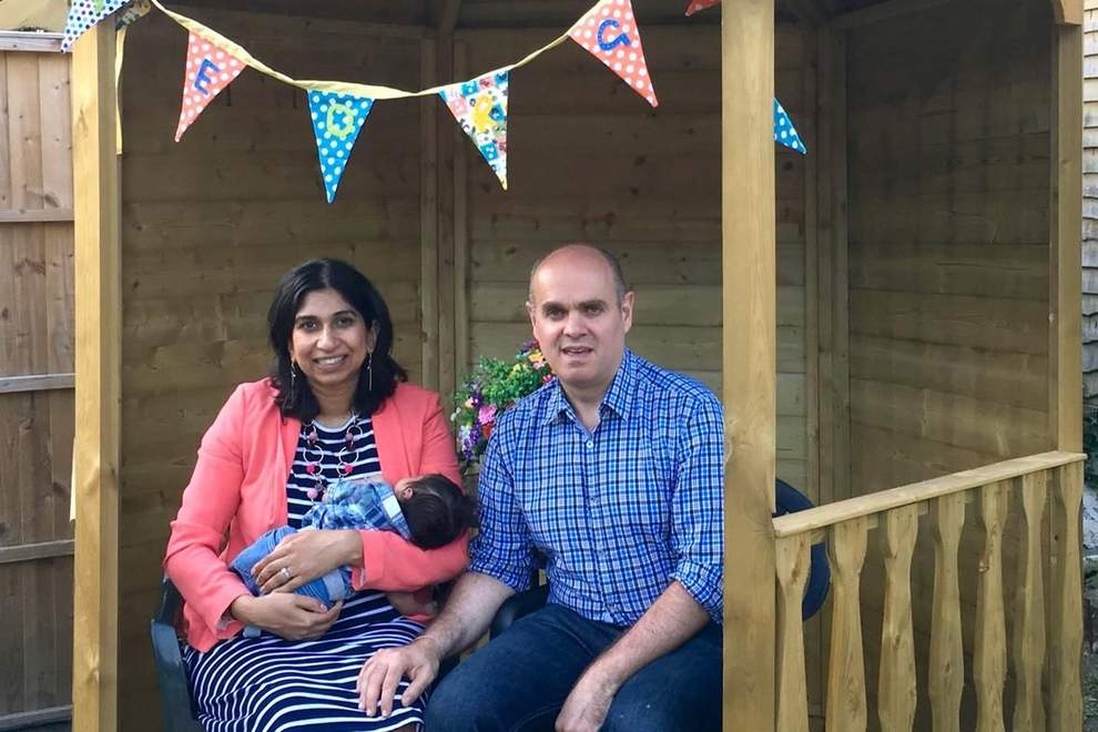 Rael Braverman and Suella Braverman with their child