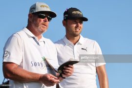 Who is Tim Tucker caddying for now?