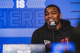 How many sacks did Travon Walker have in college?
