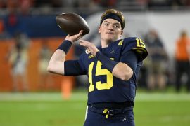 What position does JJ Mccarthy play? What number is JJ Mccarthy for Michigan?
