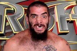 How did Mark Briscoe lose his teeth?