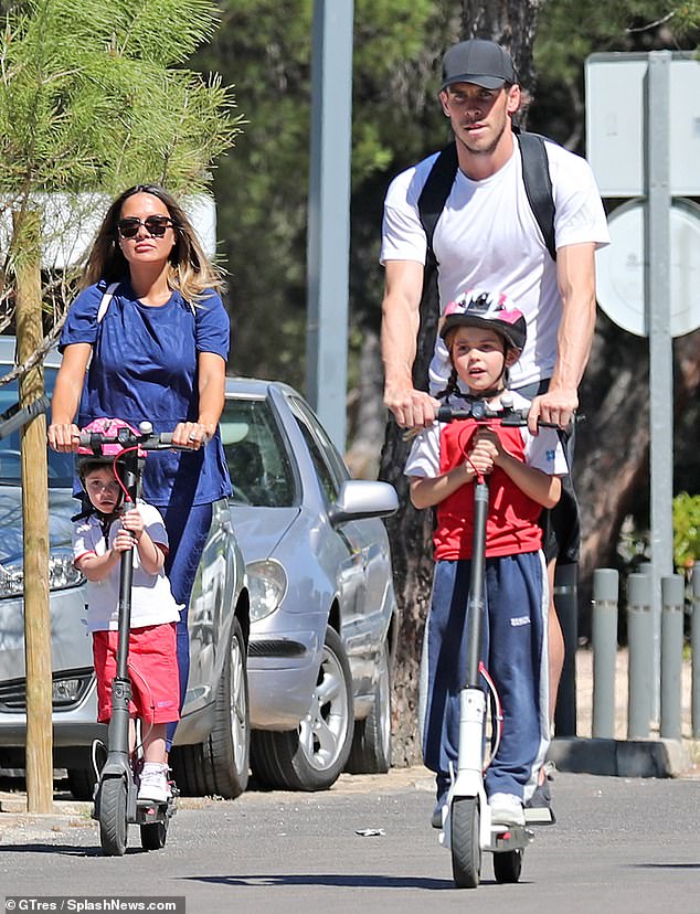 Gareth Bale with his wife and children 