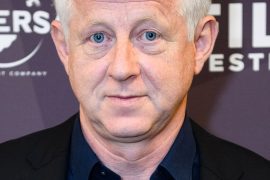 What movies has Richard Curtis written? Who wrote Notting Hill and Love Actually?