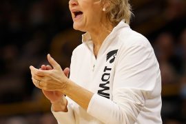 When was Lisa Bluder hired? How long has Lisa Bluder been at iowa?