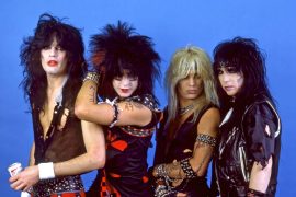Who is suing Mötley Crüe?