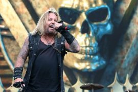 Why did Mötley Crüe kick Vince Neil out? Who did Mötley Crüe replace Vince Neil with?