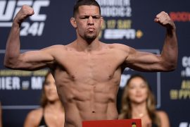 Who gave Nate Diaz his black belt? Is Nate Diaz a striker or grappler?