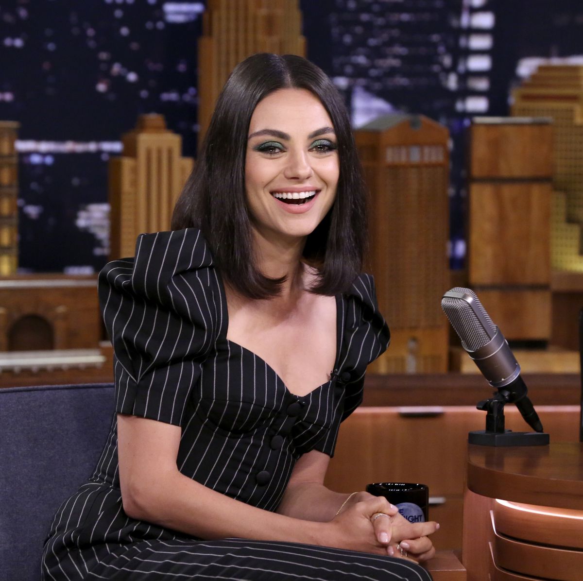 Who plays the younger Mila Kunis? Where does Mila Kunis live now?