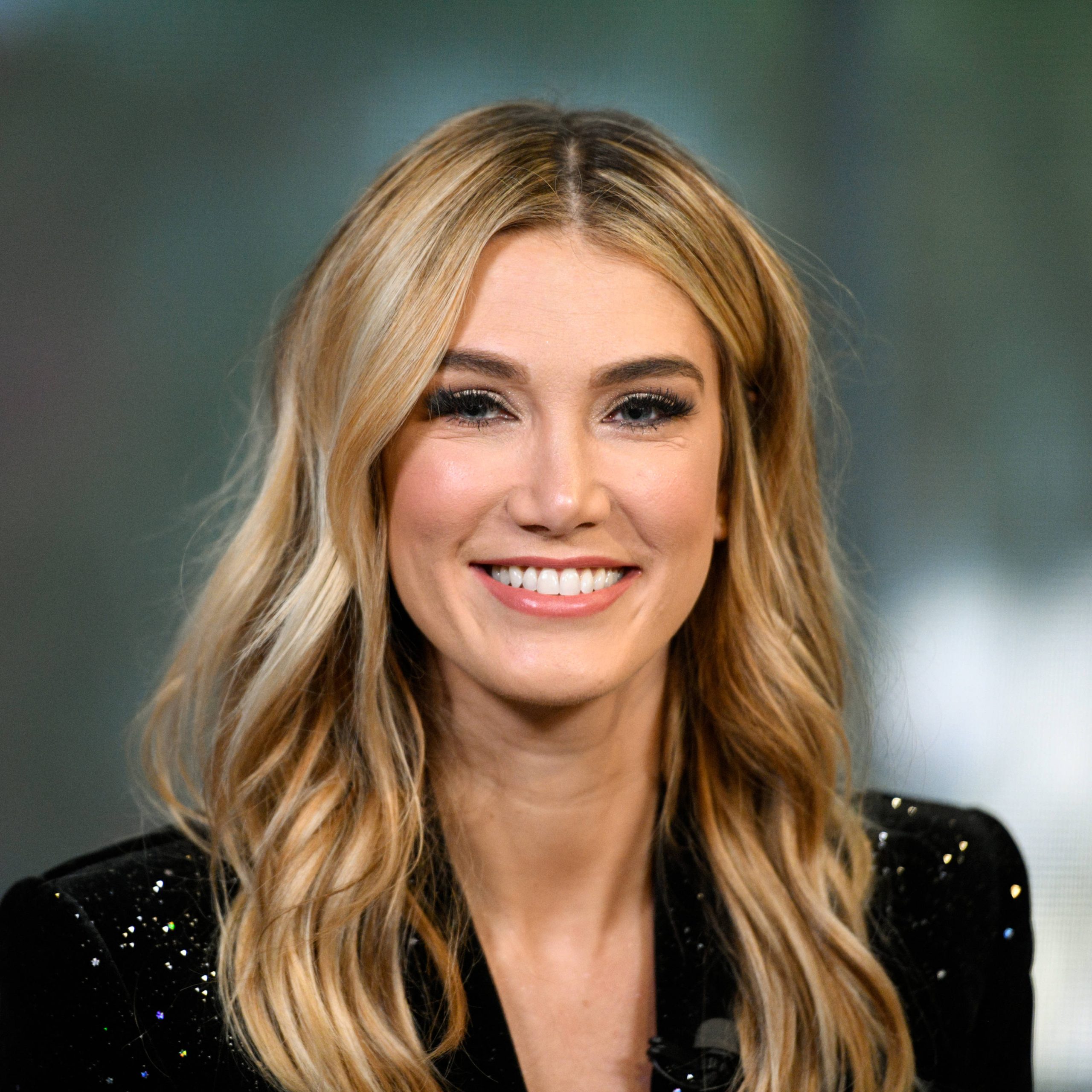 Did Delta lose her voice? Did Olivia Newton John like Delta Goodrem?