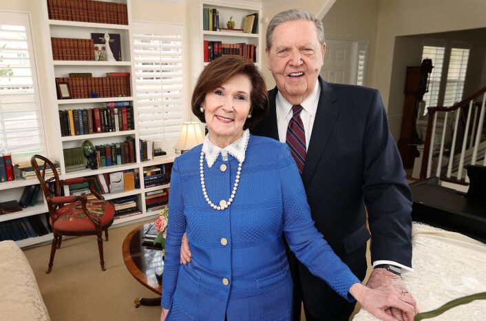 Where did Elder Holland meet his wife? Where is Sister Holland from?