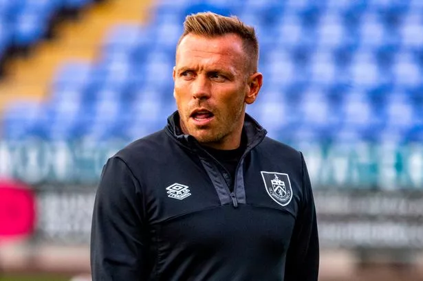 How many goals did Craig Bellamy score? How many premierships has Craig Bellamy won as a coach?