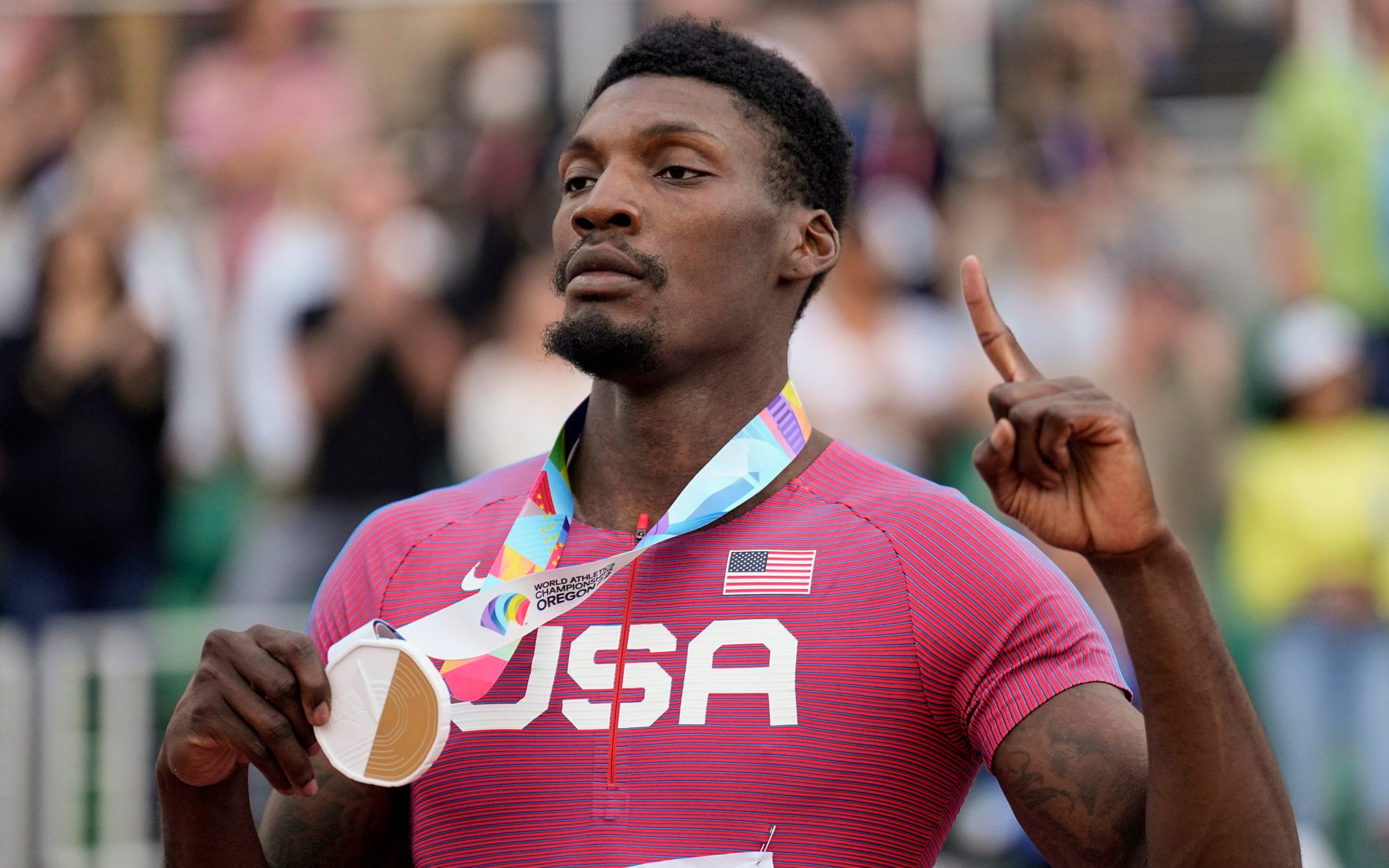 Who does Fred Kerley train with? How fast did Fred Kerley run the 100m?