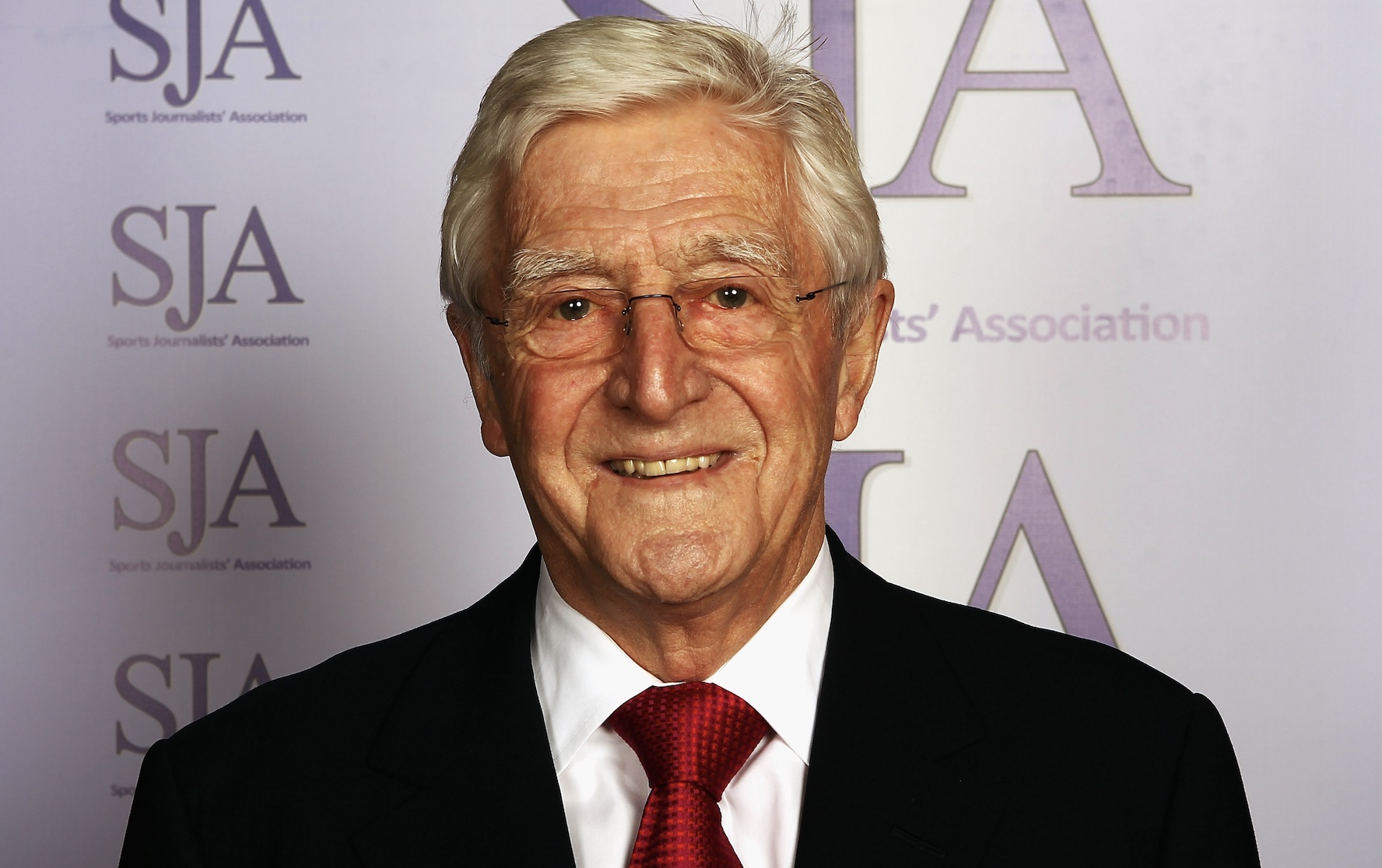 What was Sir Michael Parkinson famous for?