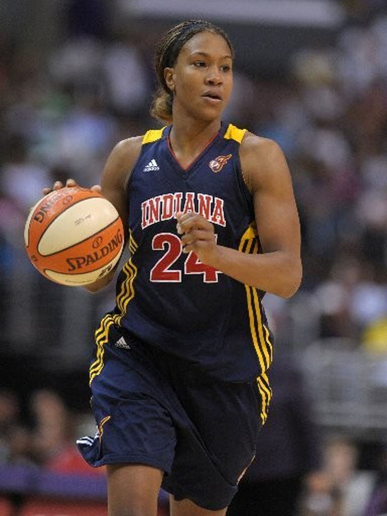 How many seasons did Tamika Catchings play? Is Kanon catchings related to Tamika?