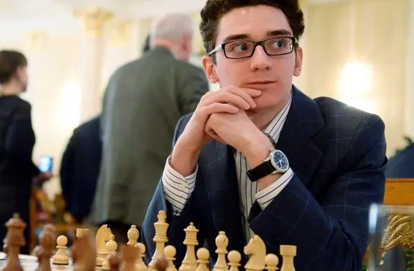 At what age Fabiano Caruana became the grandmaster in chess?