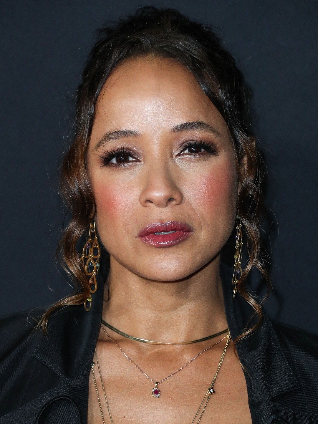 Who is the lady in red in Jumanji?