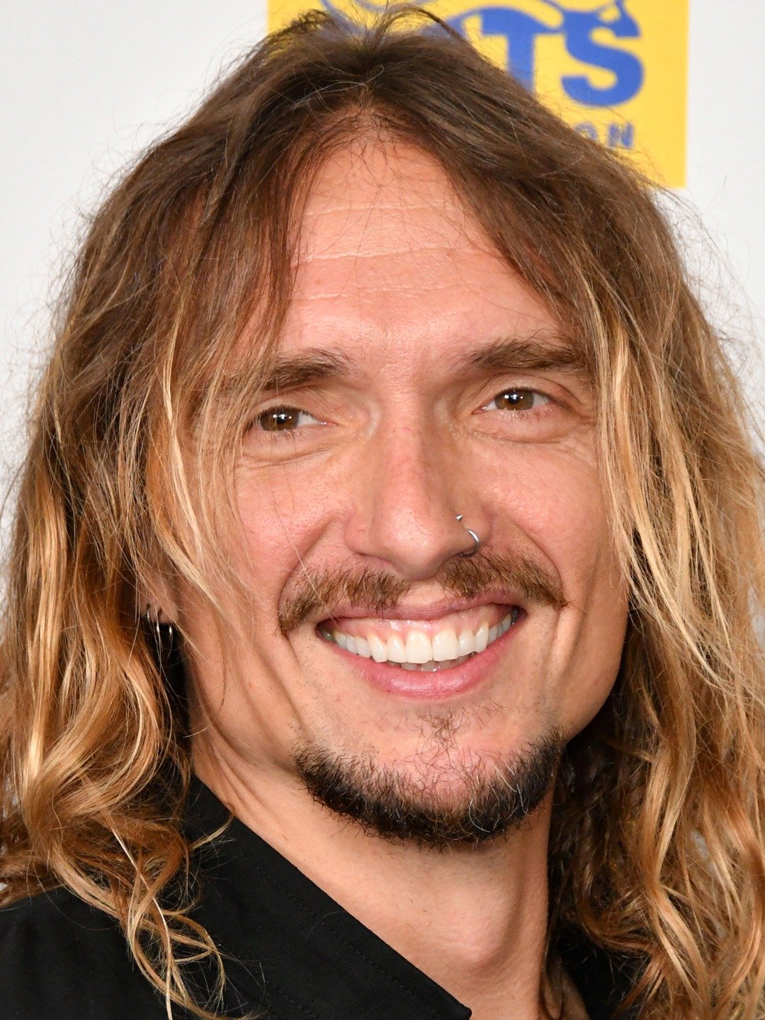 What happened between Justin Hawkins and Brian Johnson?