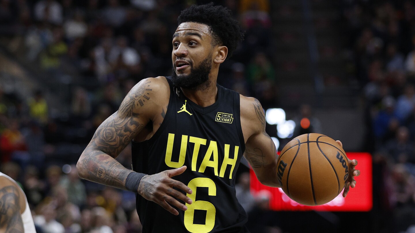 When was Nickeil Alexander-Walker born? What college did Nickeil Alexander-Walker go to?