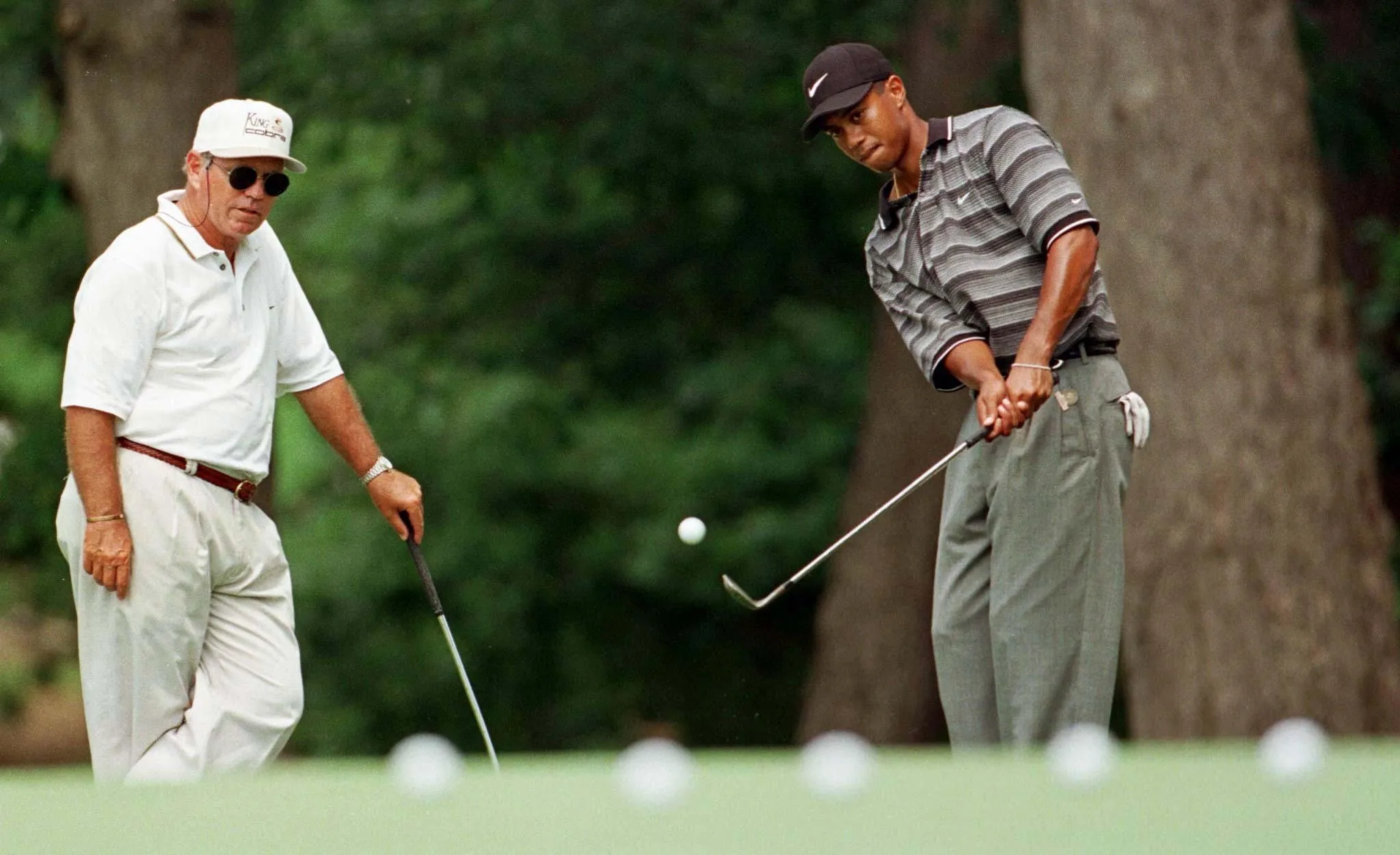 Why did Tiger Woods leave Butch Harmon?