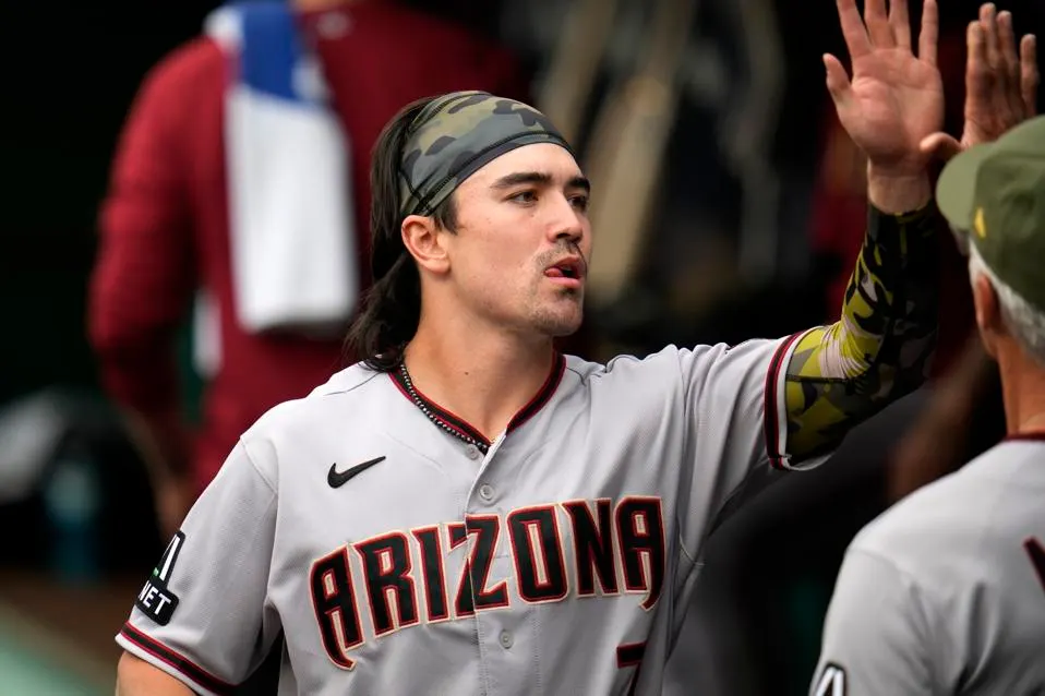 Where was Corbin Carroll born and raised?