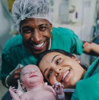 Emerson Royal with his girlfriend and child